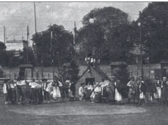 Figure 10. Life of the Slovaks by the artificial koliba shown  in  the  amphitheater  at  the  Czechoslavic  Ethnographical  Exhibition