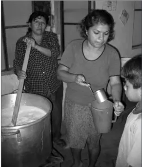 Figure 3 Peru program: fluoridated milk –after stir- stir-ring- distributed at the “mothers club”.