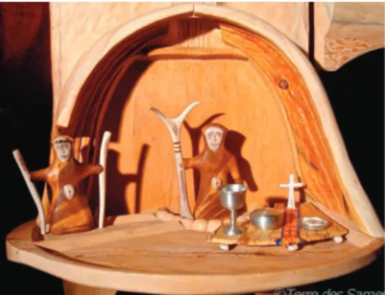 Fig. 3. Áhkkás (Sami female deities) next to  the communion table. In the scene in the tent  the Christian symbols are in the sacred place  across the entrance