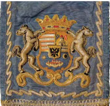 6. kép.  Száraz, poros és kopott, de erős textilanyagú zászlószala- zászlószala-gon megőrződött Temesvár Szabad Királyi Város hímzett címere.