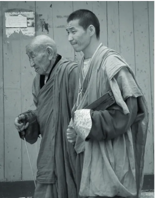 Fig. 1. An old monk, Ven. L. Išǰamc and his disciple. Gandantegčenlin xīd Monastery,   Ulānbātar 2010