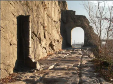 Fig. 1. Roman road cut into rock, with a milestone and a gate. Donnas, Aosta, Italy(source: http://www.crdl.scuole.