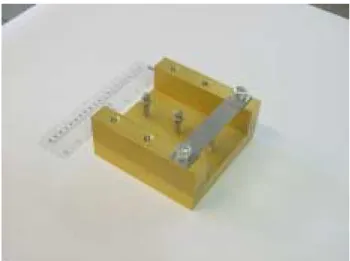 Figure 3 : EB Varestraint Test Fixture and (P) Loaded Specimen