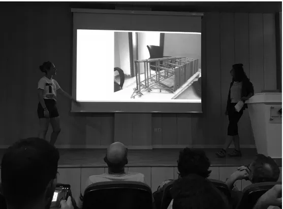 Fig. 3: students presenting their design in a formal meeting