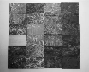 Figure 1.—Application of various ebru techniques on wood samples.