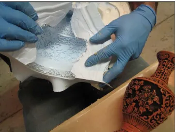 Figure 11. Interconnecting printed pattern pieces together  Molding frame is assembled around the model and the whole  surface  including  the  frame  is  being  warnished  with  special  mold  release  agent