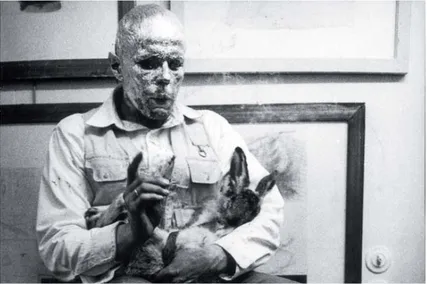 Şekil 1.4 : Joseph Beuys, “Ölü Bir Tavşana Resimler Nasıl Açıklanmalı”  Kendini sosyal bir heykel olarak tanımlayan sanatçı, bu kavramı ile heykel sanatını  geleneksel anlayışının ötesinde değerlendirmektedir