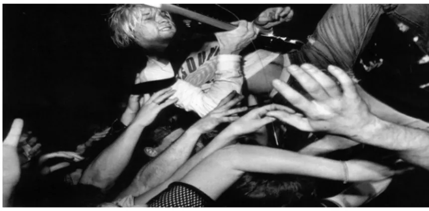 Figure 2 Kurt Cobain with his fans 4