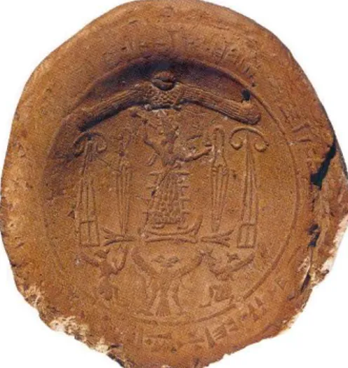 Figür 23: Alacahöyük Sfenksli Kapı yan süslemeleri Figür 24: Boğazköy çift başlı kartal betimli  kil mühür baskısı