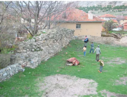 Fig 2. Inner face of the probable Roman fort wall at Işıklı showing its  coursed rubble construction (photograph courtesy of B