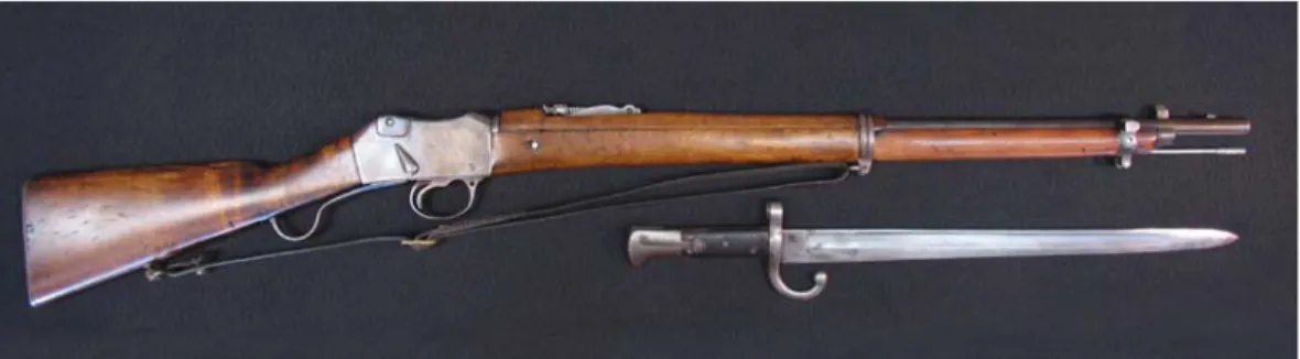 Fig. 9. A post-1910 Peabody Martini Riﬂe as chambered for the standard Mauser 7.65 × 53  cartridge, with the shortened barrel, ‘Turkish Model’ 1903 woodwork, alongside a straightened 