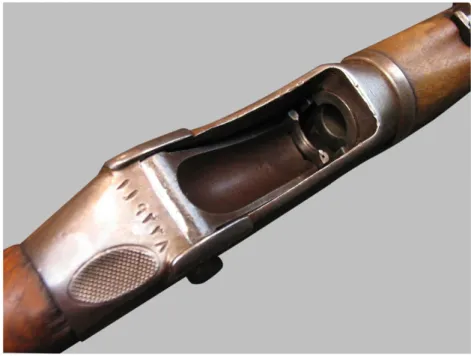 FIGURE 10. Detail of the breech assembly of a post-1911/1912 converted Peabody-Martini Rifle, with the serial number 119237, and showing the chequered thumb rest copied directly from the original pattern model for the Peabody-Martini Rifle (photograph supp