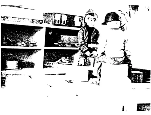 Figure  5.4.  Children  Playing  with  Blocks  (From  CARTWRIGHT,  SALLY.  "Learning With  Large  Blocks."  Young