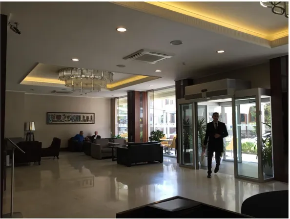 Figure 6: Main entrance of Eyüboğlu Hotel's lobby with full glazing gate 