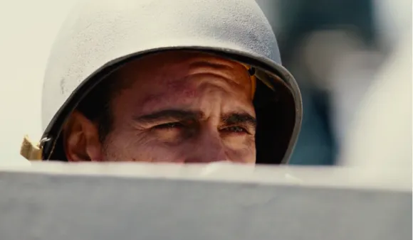 Figure 10. Freddie Quell (Joaquin Phoenix) wearily watches an undisclosed location 