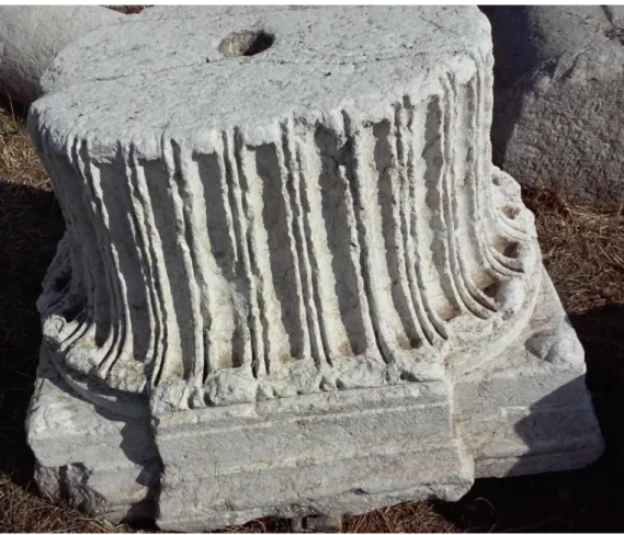 Figure 3. “Hellenistic-style” fluted capital on display at the Roman Bath  Museum, upside-down
