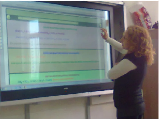Figure 4.Teacher can use her finger to draw or highlight something on the IWB  screen 