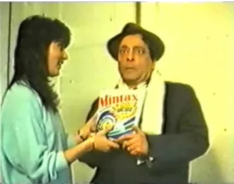 Figure 2. Mintax (1986) – Father gets surprised when he learns that his wife and daughter already  knows what he has just learned