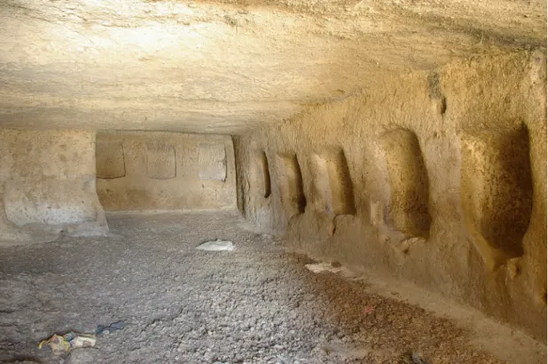 Fig. 18. A multi-functional stable in Selime with diverse sized-mangers. The mangers on the right are  for cattle, height: 50 cm; the low ones on the left are for sheep and goats, height: 20-30 cm, the three  mangers at the rear are for horses, height: 80 