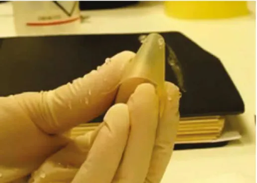Figure 4.8: Rolling water droplets from Me35 coated polyethersulfone sample even when the film is bent.