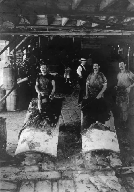 Figure 2. An image from J.A. Lord Jr leather shop’s beam house in 1906. These three leatherworkers were identified in the original picture as Big Greek, Greek M., and Greek D.