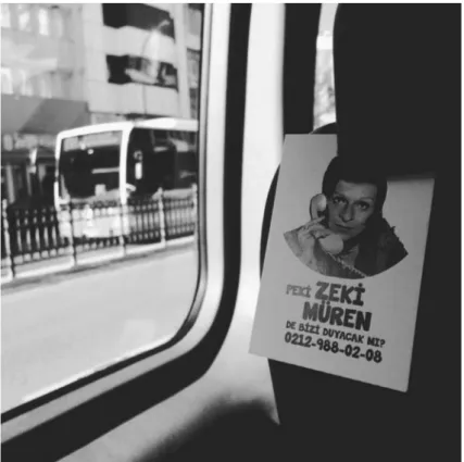 Figure 1. Poster for Zeki Müren hotline on a public bus in istanbul, turkey, 2016. (text: “so, can Zeki Müren  hear us, too?”)
