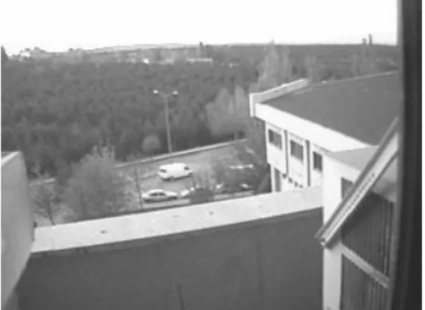 FIGURE 2. An image of a moving minivan from a video sequence.