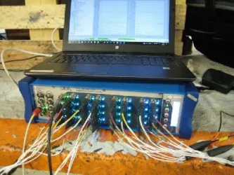 Figure 26. OROS 38 analyser with the measurement laptop.  